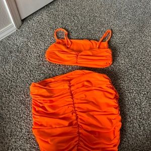 Two piece, bright, orange set